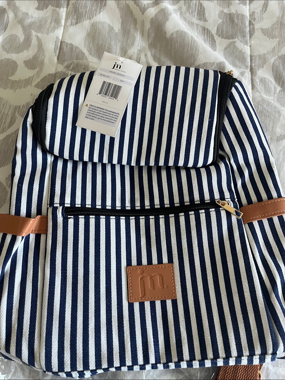 Striped Navy and White Backpack with Tan Accents